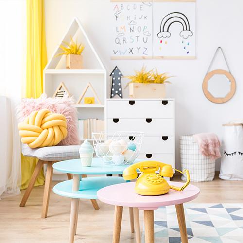 A kid's bedroom design with yellow and bright colours. 