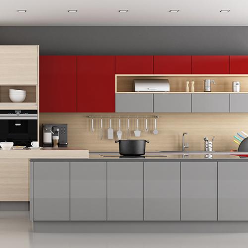 A kitchen design with red and grey cabinets.