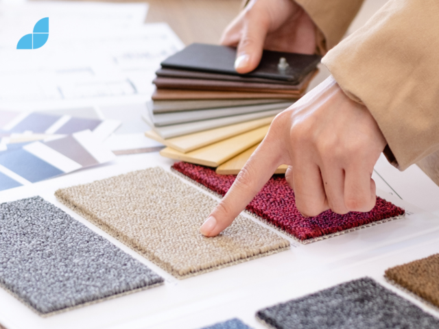 Interior designer comparing colour palette with carpet colours